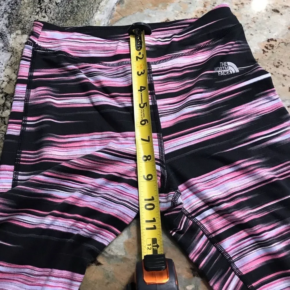 The North Face Leggings in black and pink